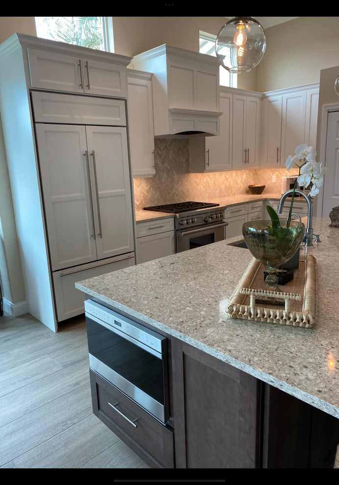 Example of a transitional kitchen design in Miami