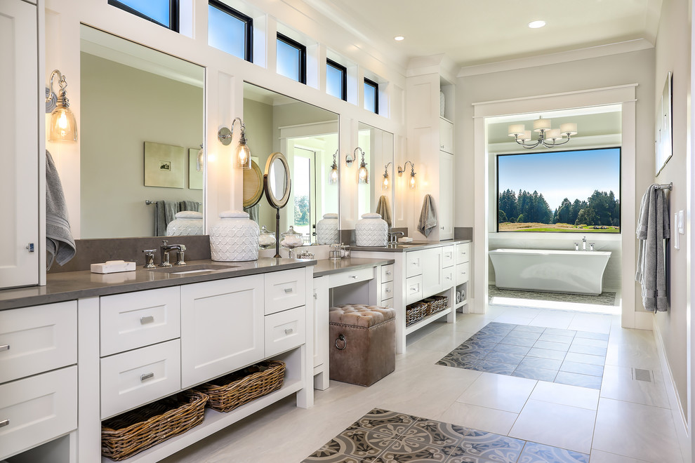Design ideas for a large country master bathroom in Portland with shaker cabinets, white cabinets, a freestanding tub, grey walls, an undermount sink, an open shower, a two-piece toilet, ceramic floors, engineered quartz benchtops, multi-coloured floor, a hinged shower door and white benchtops.