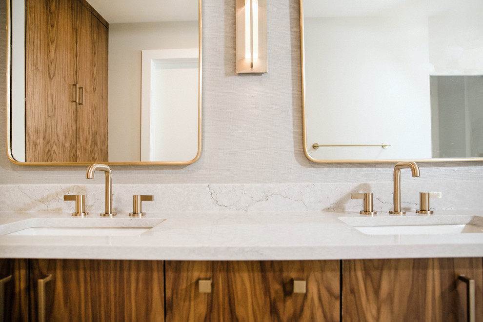 Inspiration for a large midcentury master bathroom in Austin with flat-panel cabinets, brown cabinets, a corner tub, a corner shower, white tile, marble, white walls, a drop-in sink, engineered quartz benchtops, grey floor, a hinged shower door and white benchtops.