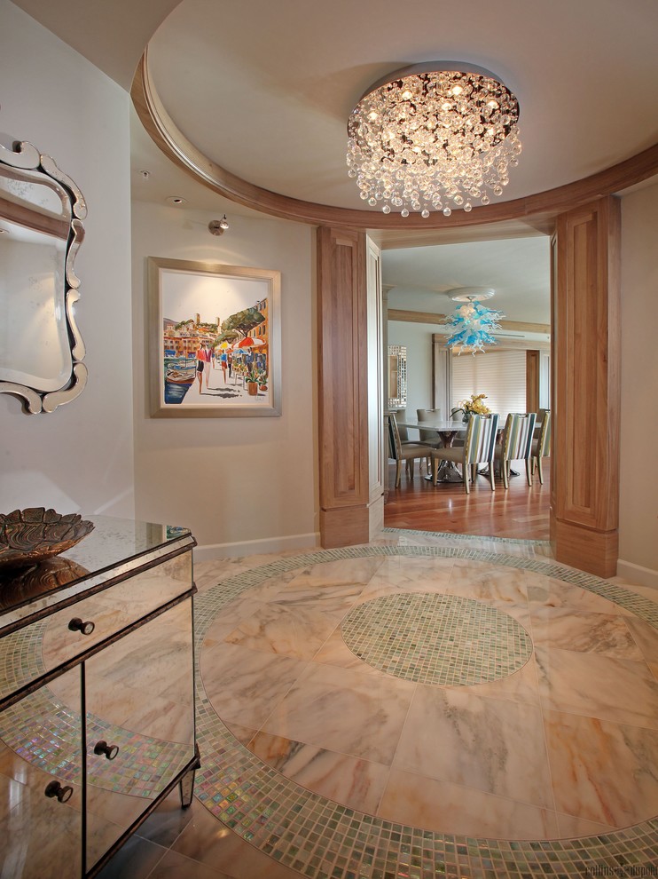 Mid-sized transitional foyer in Miami with marble floors and grey walls.
