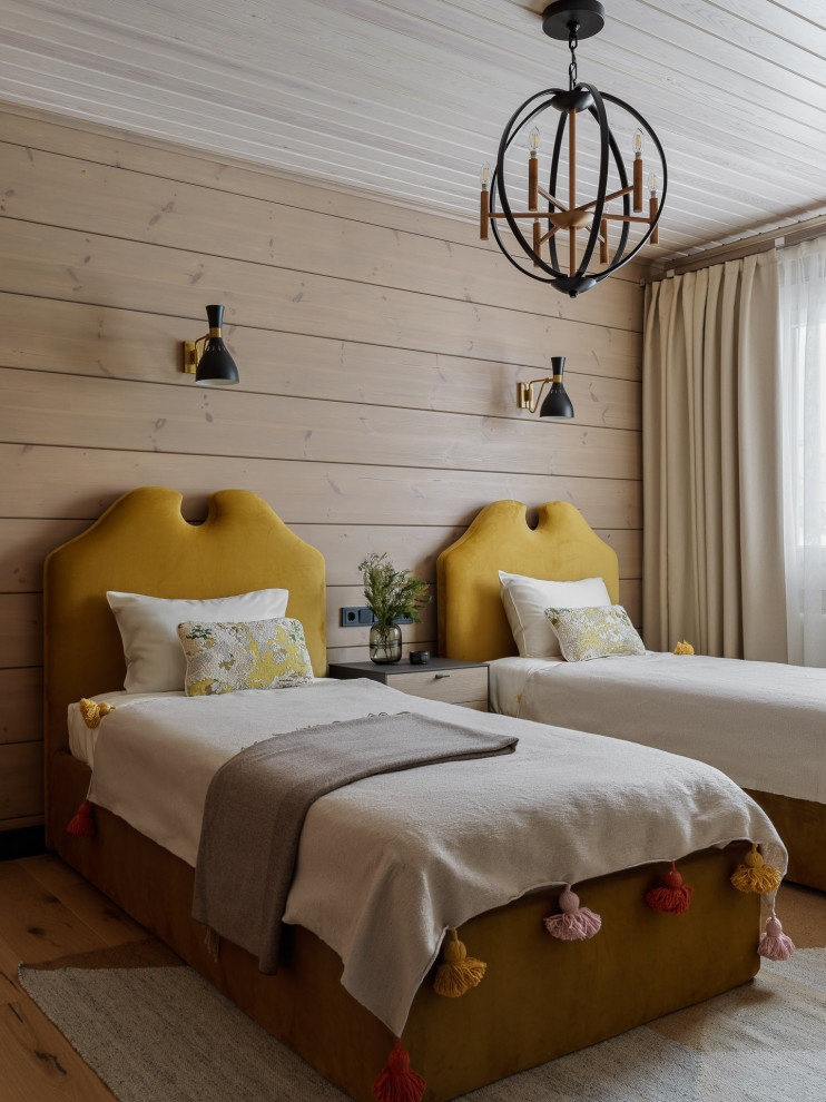 Design ideas for a country kids' bedroom for kids 4-10 years old and girls in Moscow with medium hardwood floors, wood, wood walls, beige walls and brown floor.