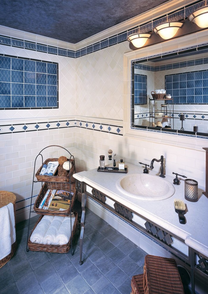 Example of a mid-sized transitional beige tile bathroom design with beige walls and a drop-in sink