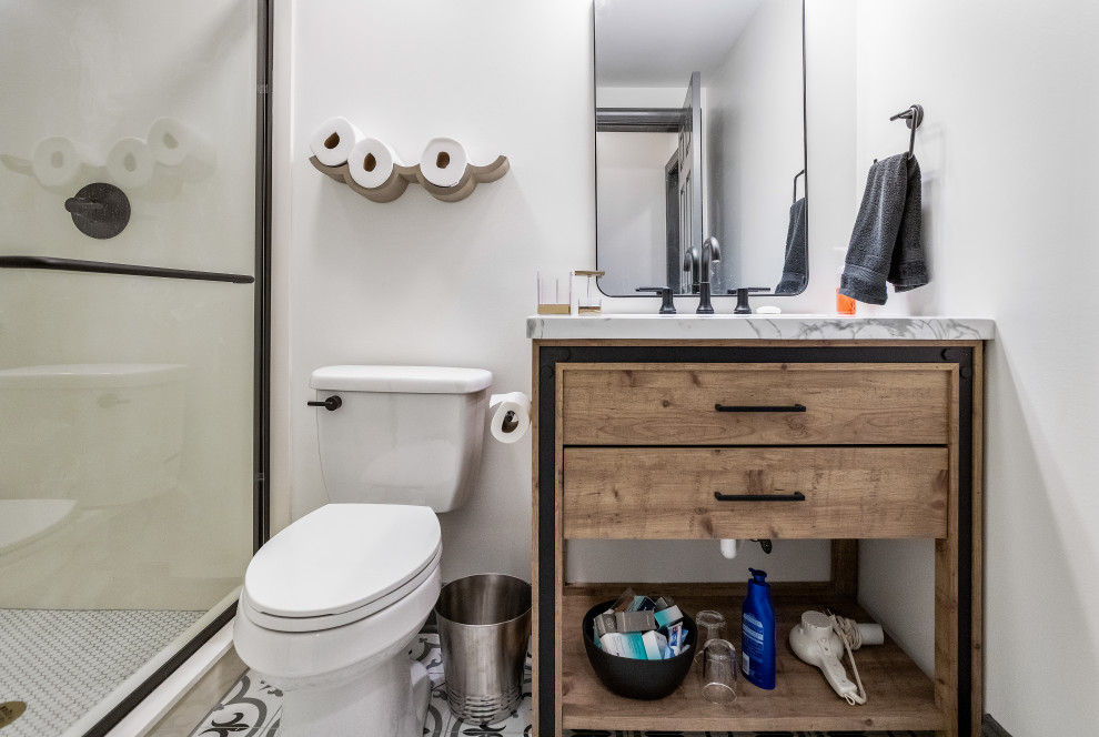 Small transitional 3/4 white tile porcelain tile, multicolored floor and single-sink bathroom photo in Atlanta with flat-panel cabinets, distressed cabinets, white walls, an integrated sink, concrete countertops, gray countertops, a niche and a freestanding vanity