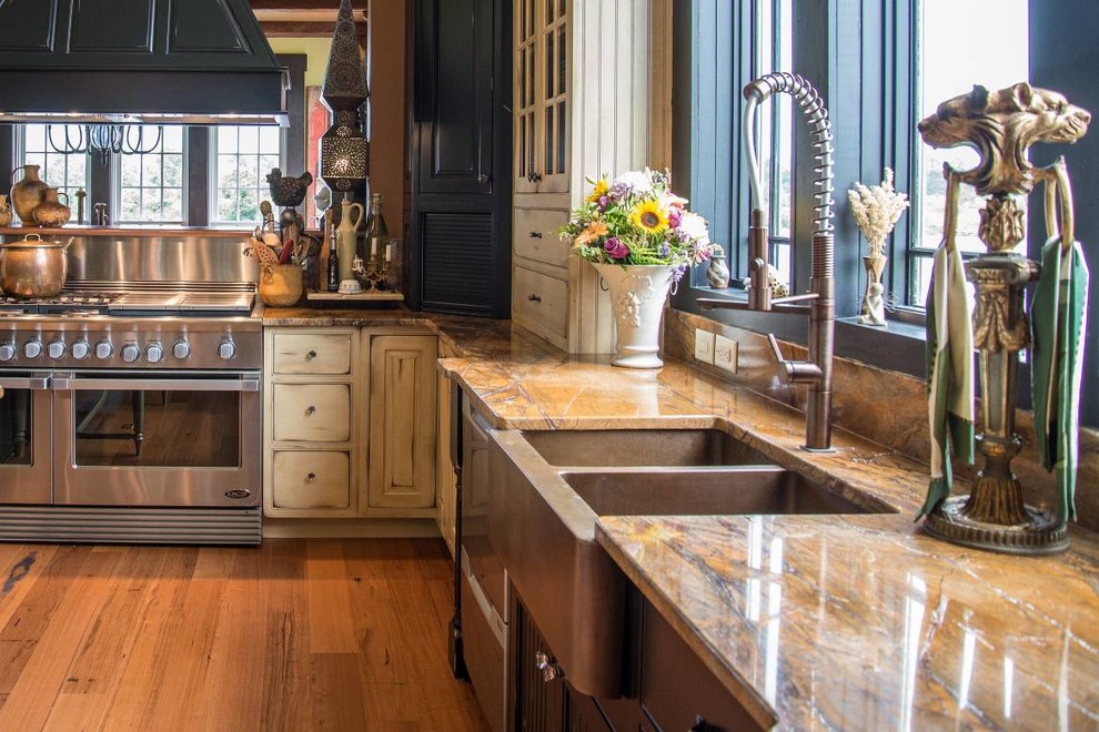 Kitchen - kitchen idea with white cabinets, granite countertops and cement tile backsplash