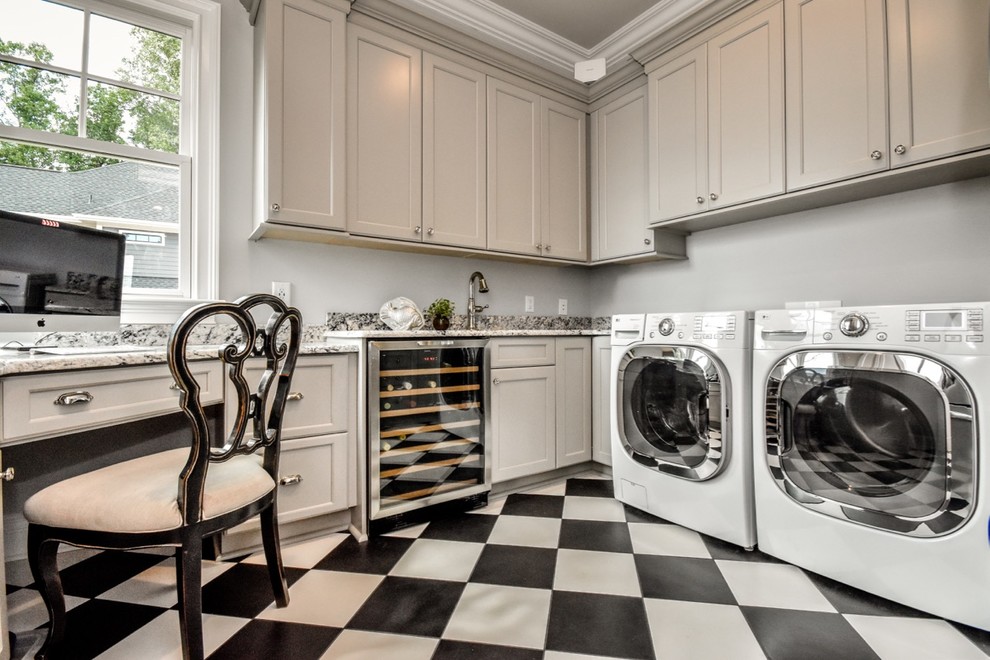 Large transitional u-shaped utility room in Charlotte with an undermount sink, recessed-panel cabinets, beige cabinets, granite benchtops, grey walls and a side-by-side washer and dryer.