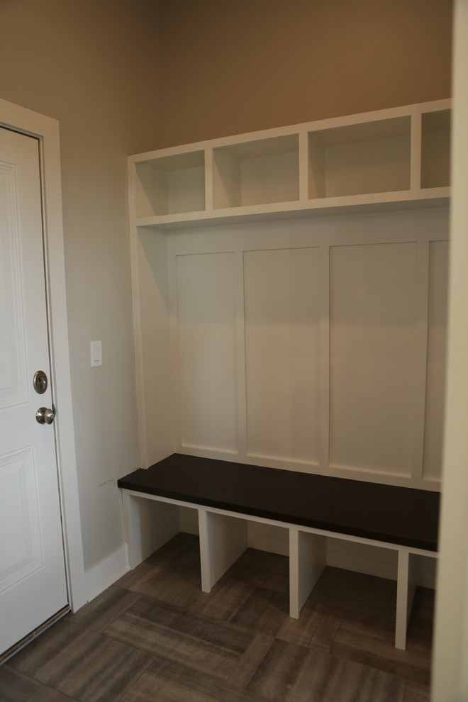 Mid-sized transitional porcelain tile home design photo in Chicago with gray walls