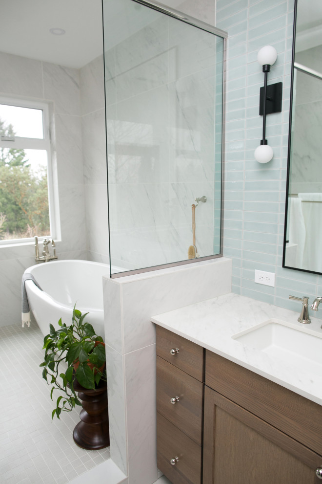 Medium sized contemporary ensuite bathroom in Portland with a freestanding bath, a shower/bath combination, double sinks and a freestanding vanity unit.