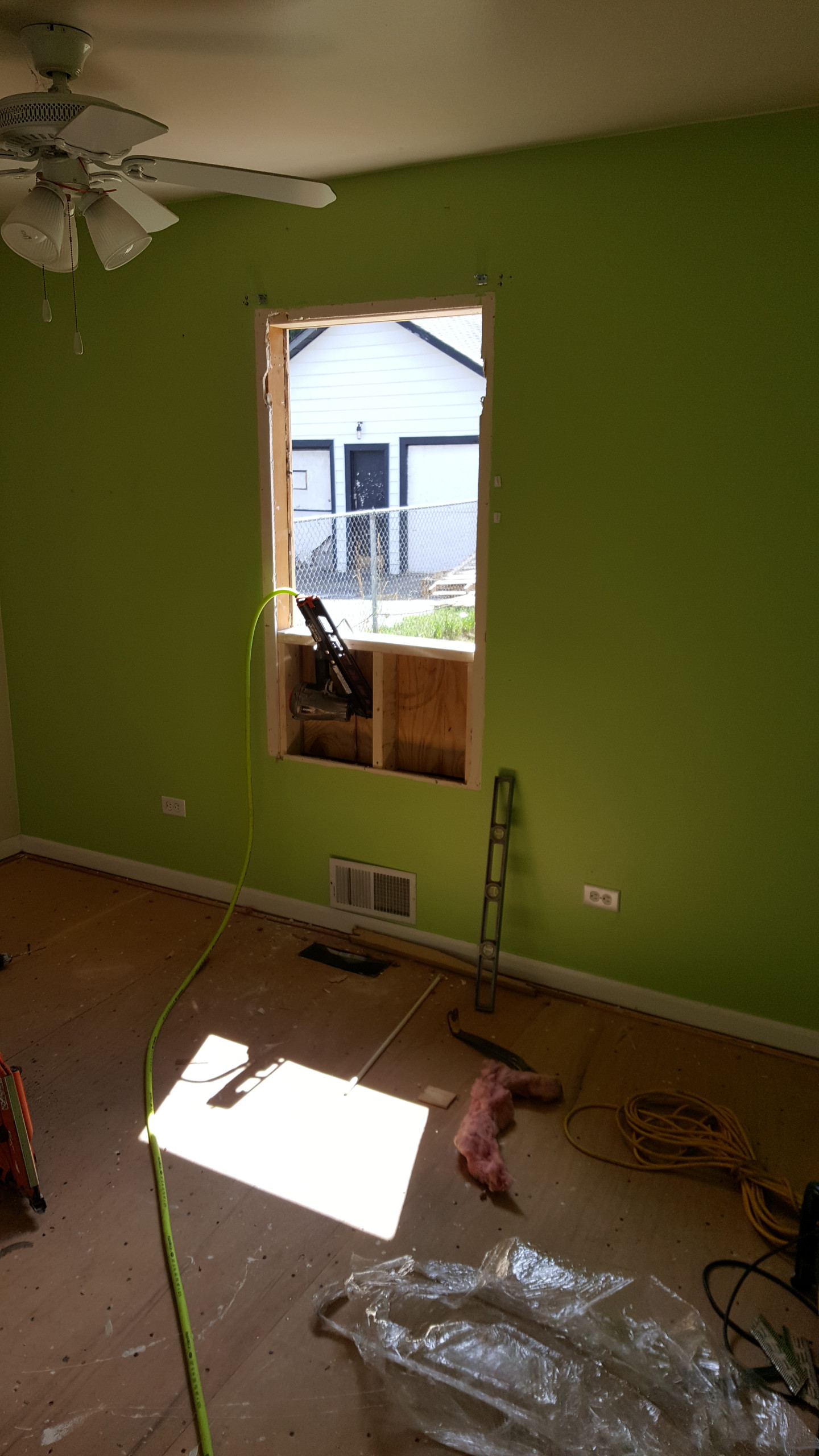 Modifying window sizes...this small bedroom will be the new laundry/utility room