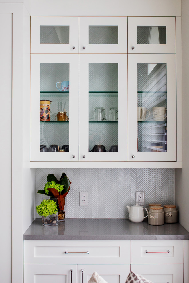 Example of a transitional kitchen design in Toronto