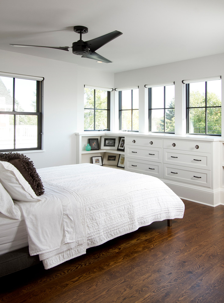 Inspiration for a transitional bedroom in Minneapolis with white walls and dark hardwood floors.