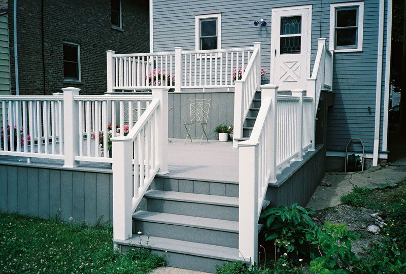 Small mountain style backyard deck photo in Chicago