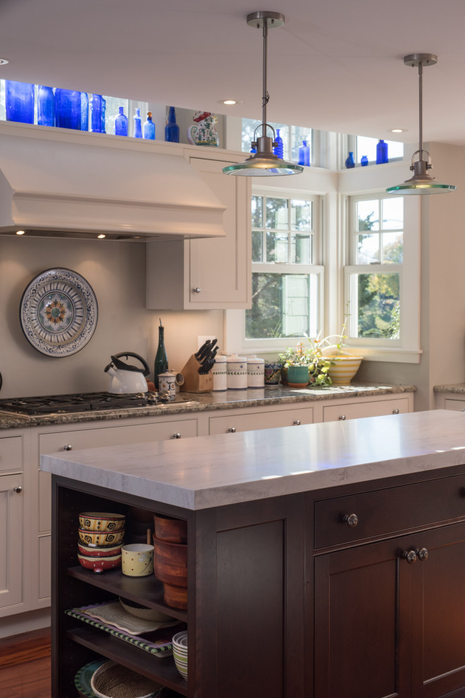 Large transitional u-shaped medium tone wood floor eat-in kitchen photo in Boston with beaded inset cabinets, white cabinets, granite countertops, white backsplash, stainless steel appliances, an island and gray countertops