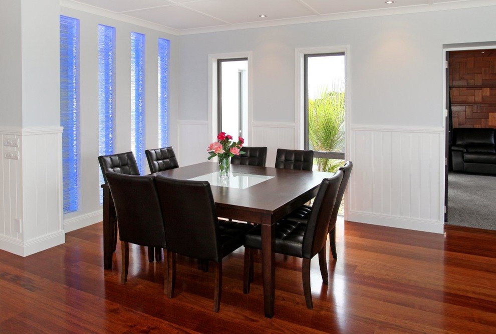 This is an example of an expansive modern dining room in Hamilton.