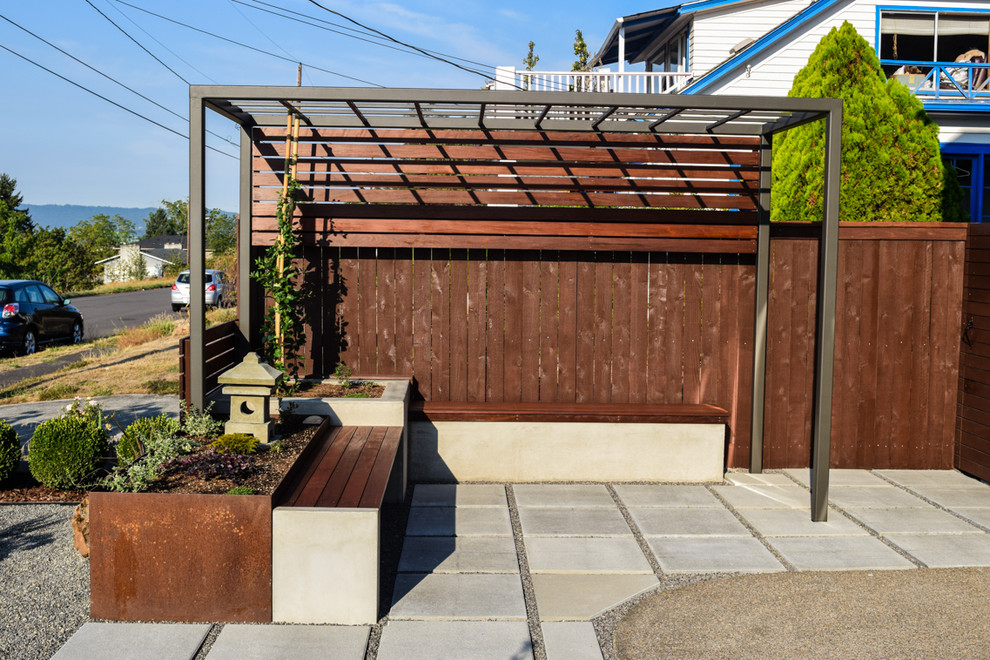 Inspiration for a small asian patio in Portland with a vertical garden, concrete pavers and a pergola.