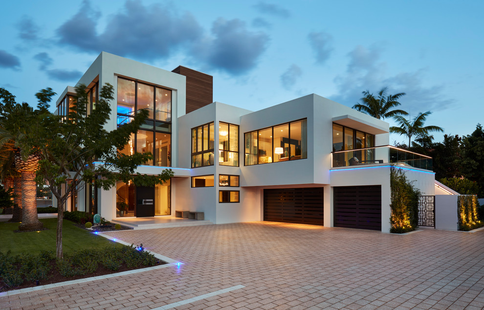 This is an example of a beach style home design in Miami.