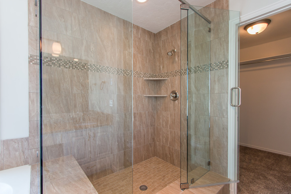 Example of a mid-sized transitional master beige tile, brown tile, gray tile and porcelain tile travertine floor drop-in bathtub design in Salt Lake City with white walls, raised-panel cabinets, white cabinets, a one-piece toilet, an undermount sink and granite countertops
