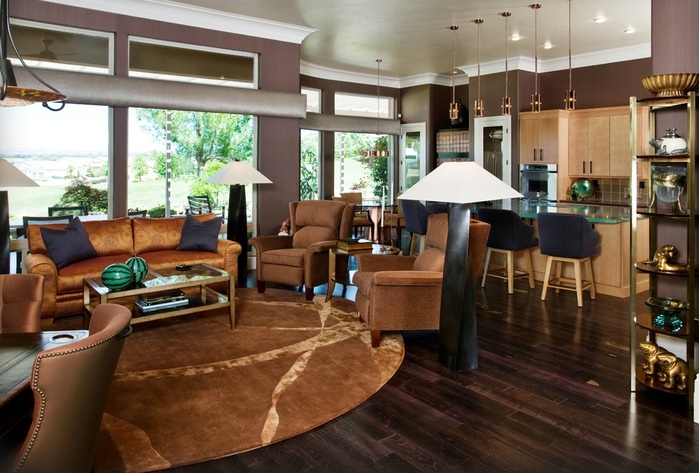 Photo of a large contemporary open concept living room in Sacramento with dark hardwood floors, a wall-mounted tv and purple walls.
