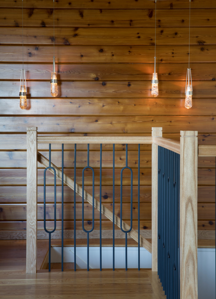 Mid-sized contemporary wood l-shaped staircase in San Francisco with mixed railing, wood walls and wood risers.