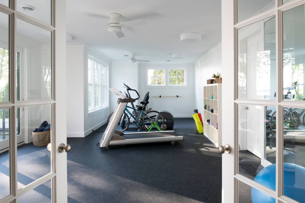 Example of a large beach style multicolored floor multiuse home gym design in Minneapolis with white walls