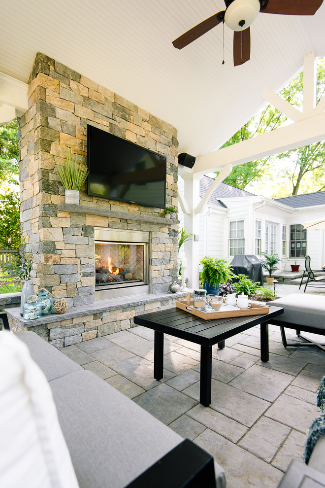 Large traditional backyard patio in Richmond with with fireplace, concrete pavers and a gazebo/cabana.