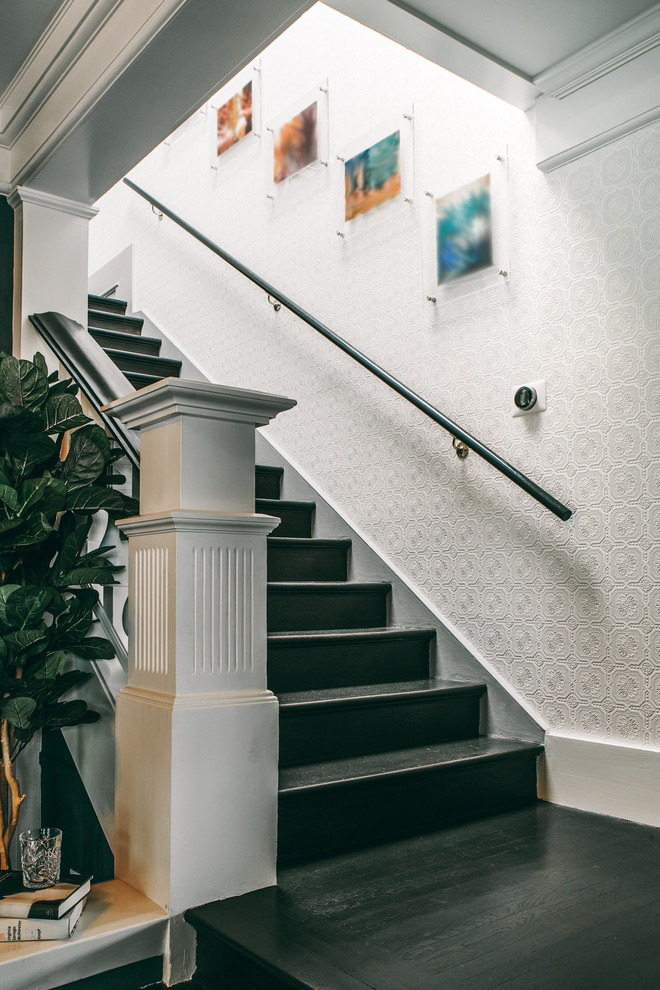 Inspiration for a mid-sized traditional wood straight staircase in San Francisco with wood risers and wood railing.