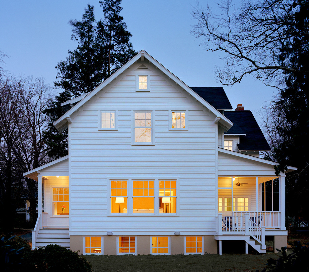 Inspiration for a traditional exterior in DC Metro with wood siding and a gable roof.