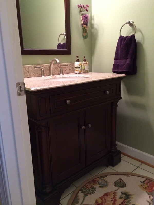 Example of a small 3/4 ceramic tile bathroom design in DC Metro with an undermount sink, shaker cabinets, dark wood cabinets and green walls