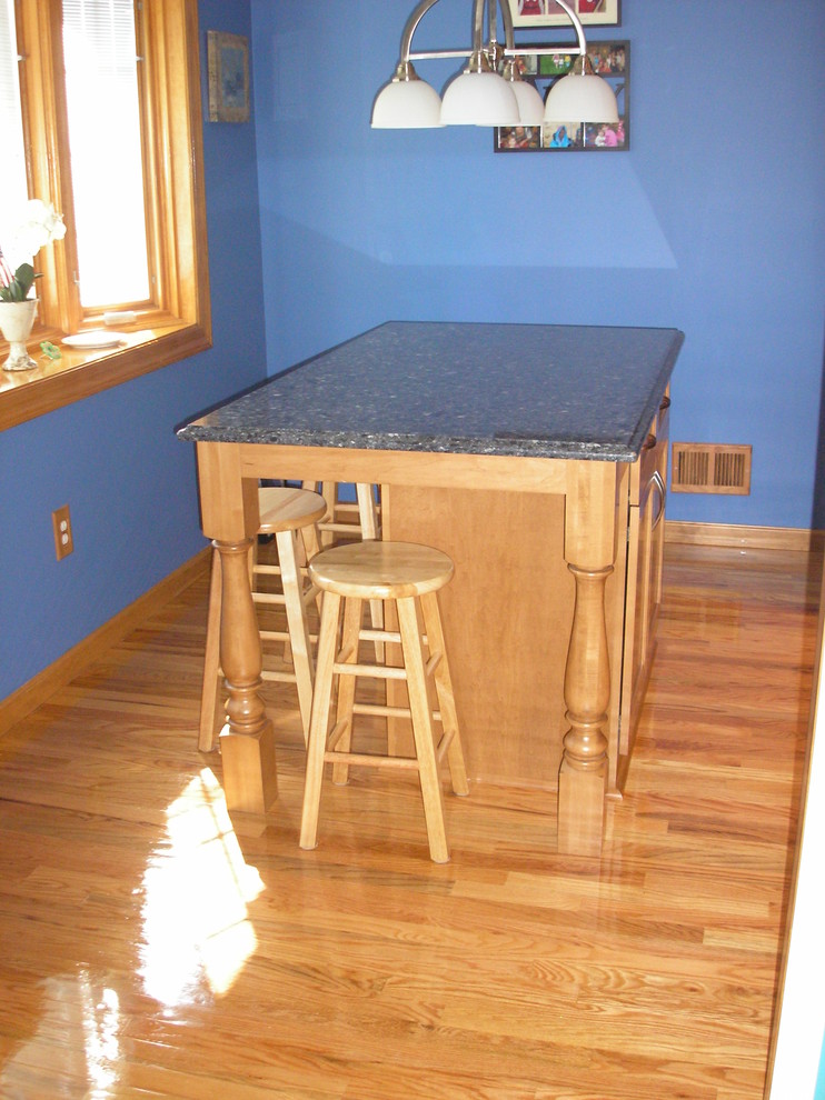 Example of a transitional kitchen design in New York