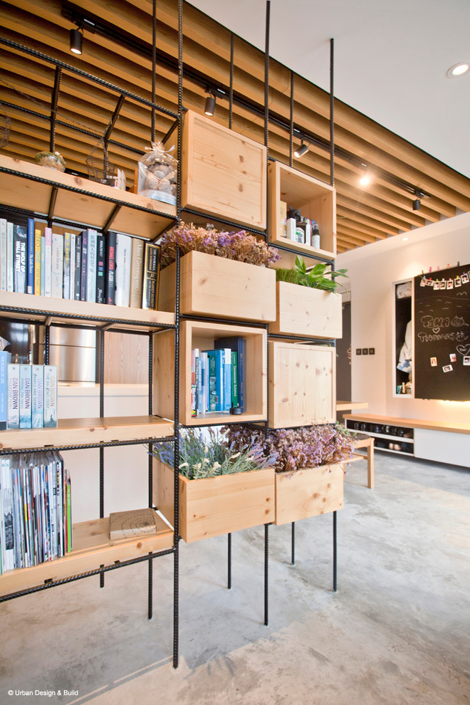 Small urban open concept concrete floor living room photo in Hong Kong