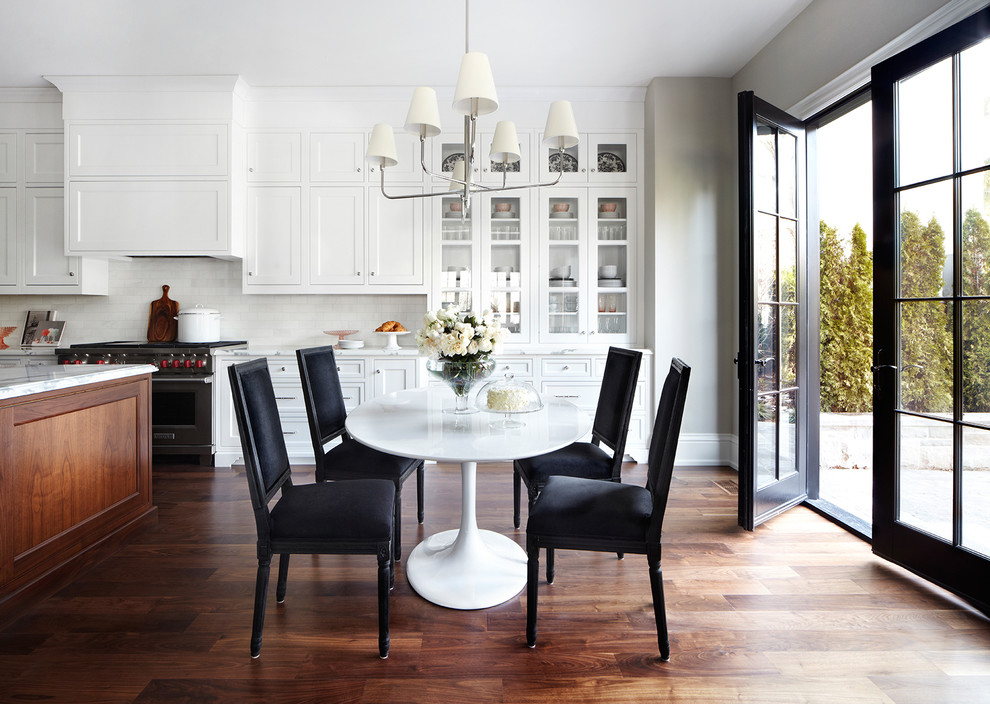 Design ideas for a transitional kitchen/dining combo in Toronto with grey walls and dark hardwood floors.