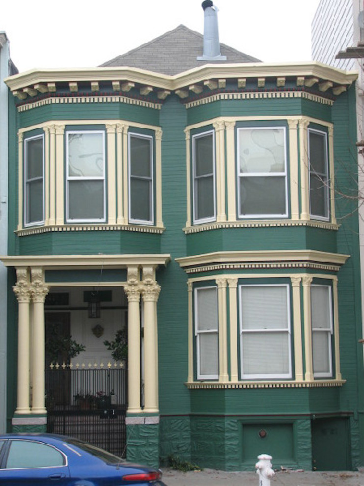 This is an example of a mid-sized traditional two-storey green exterior in San Francisco.