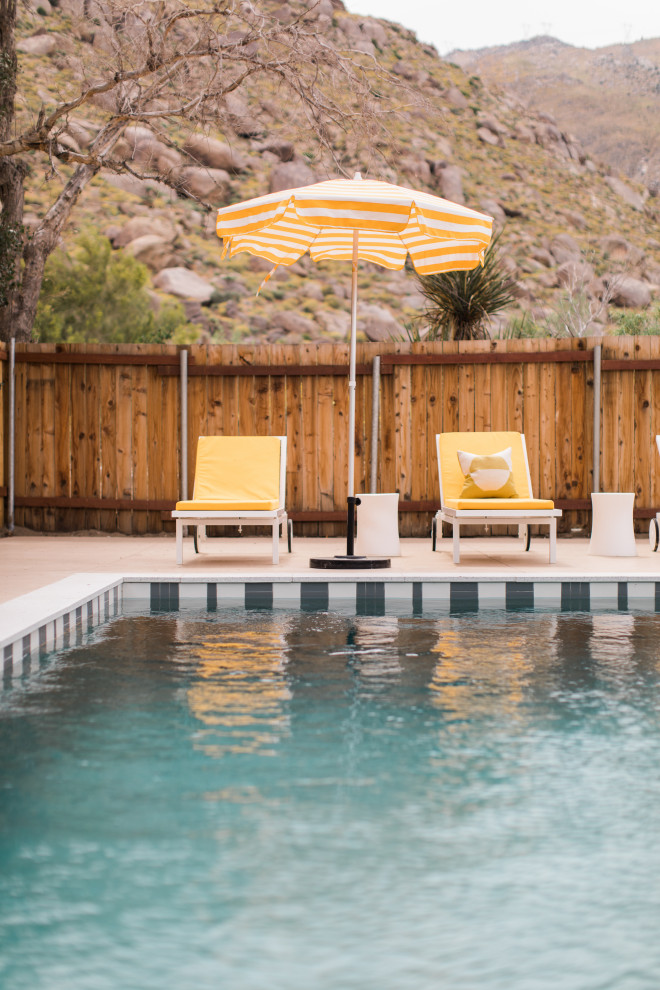 Large eclectic backyard rectangular lap pool in Los Angeles.