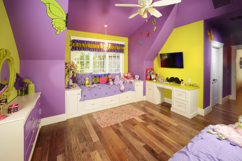 Photo of a mid-sized traditional bedroom in Other with multi-coloured walls, medium hardwood floors and no fireplace.