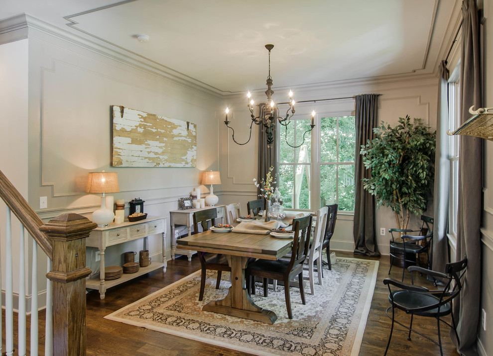 Photo of a transitional dining room in Nashville with white walls.