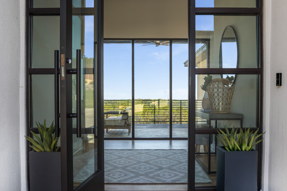 Inspiration for a transitional entryway remodel in Austin