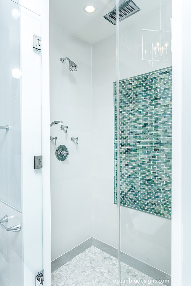 Inspiration for an expansive contemporary master bathroom in New York with white cabinets, an open shower, a one-piece toilet, green tile, white walls and a vessel sink.