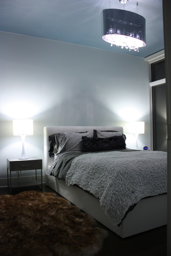 This is an example of a contemporary bedroom in Boston.