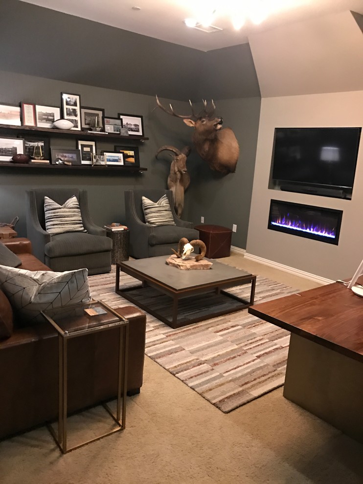 Inspiration for a mid-sized country study room in Dallas with grey walls, carpet, a hanging fireplace, a freestanding desk and beige floor.