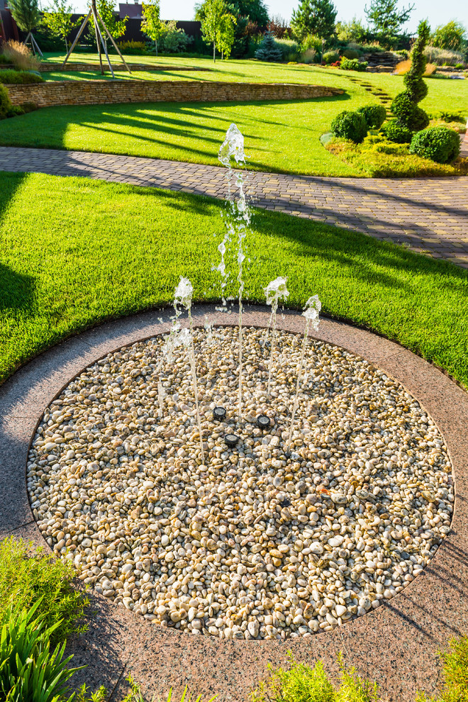 Traditional garden in Novosibirsk with a water feature for summer.