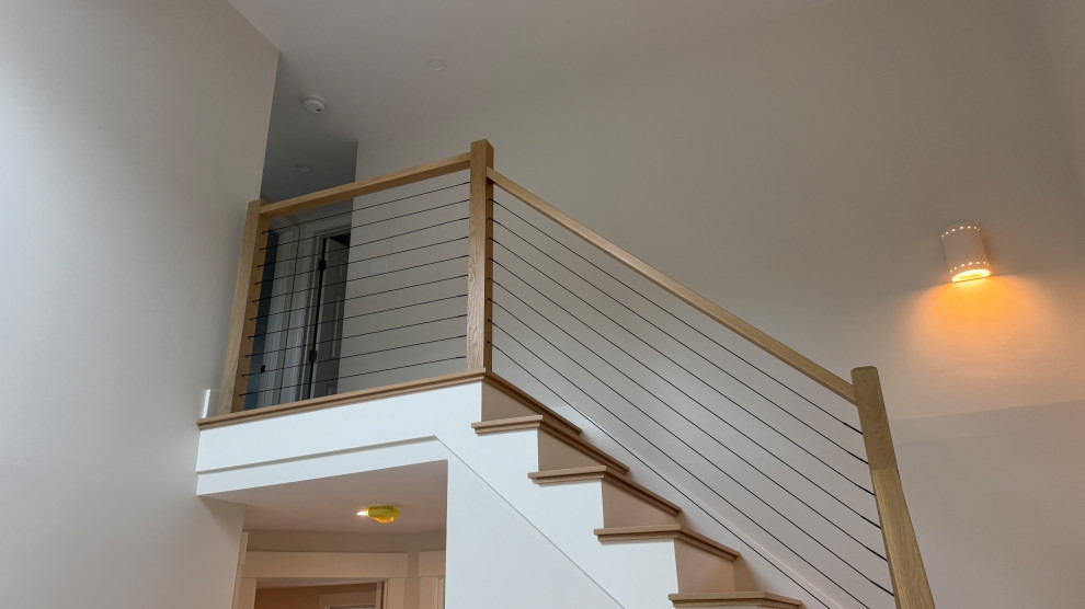 Transitional staircase photo in Boston