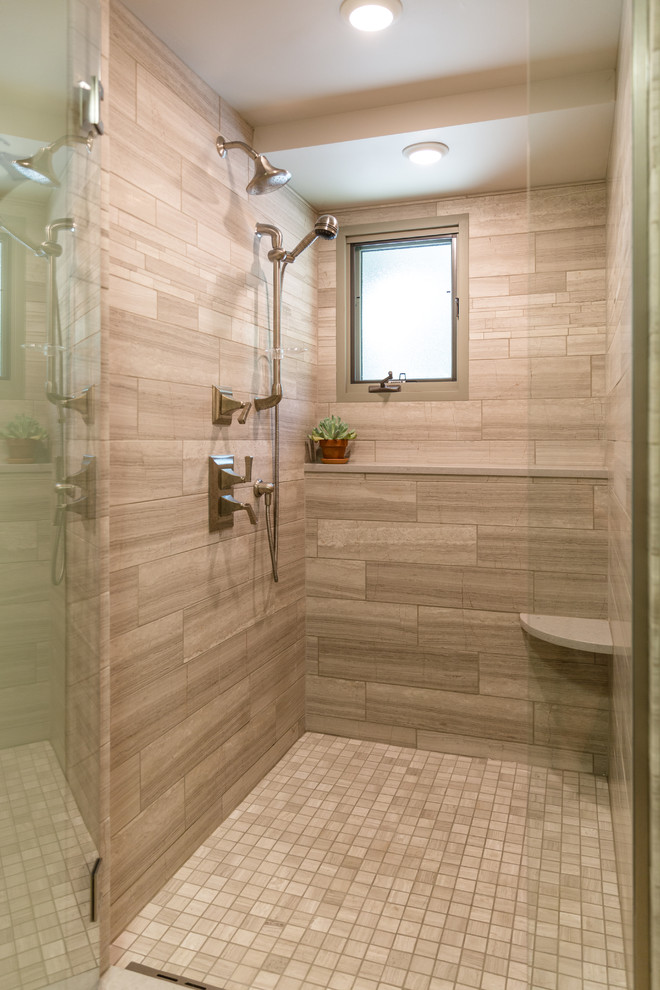 This is an example of a mid-sized transitional 3/4 bathroom in Milwaukee with medium hardwood floors, beaded inset cabinets, beige cabinets, an alcove shower, multi-coloured tile, stone tile, beige walls, an undermount sink and laminate benchtops.
