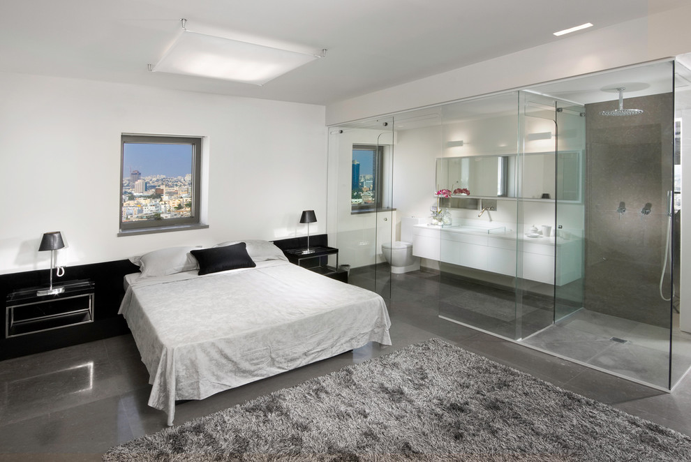 This is an example of a contemporary bedroom in Other with white walls.