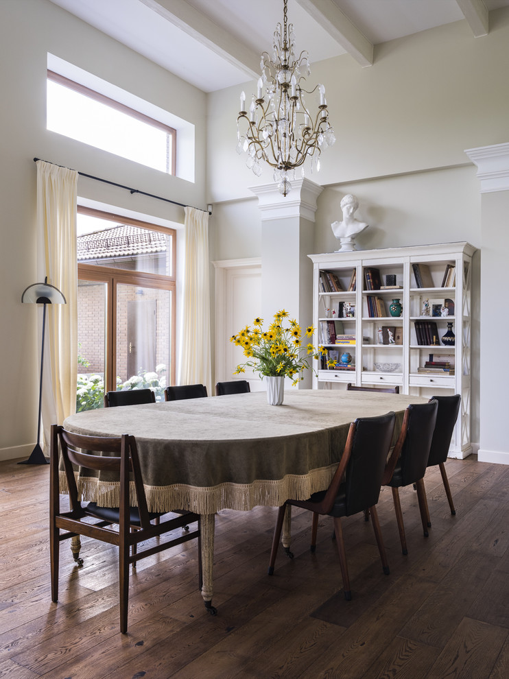 Design ideas for a contemporary dining room in Moscow with beige walls, dark hardwood floors and brown floor.