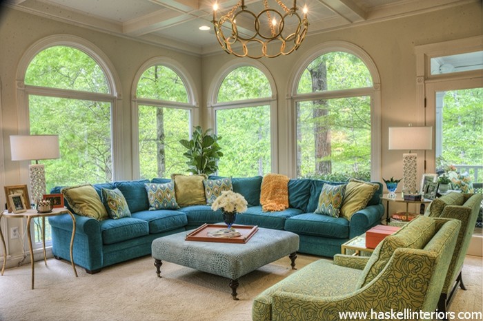 Inspiration for a large transitional enclosed living room in Austin with beige walls and carpet.