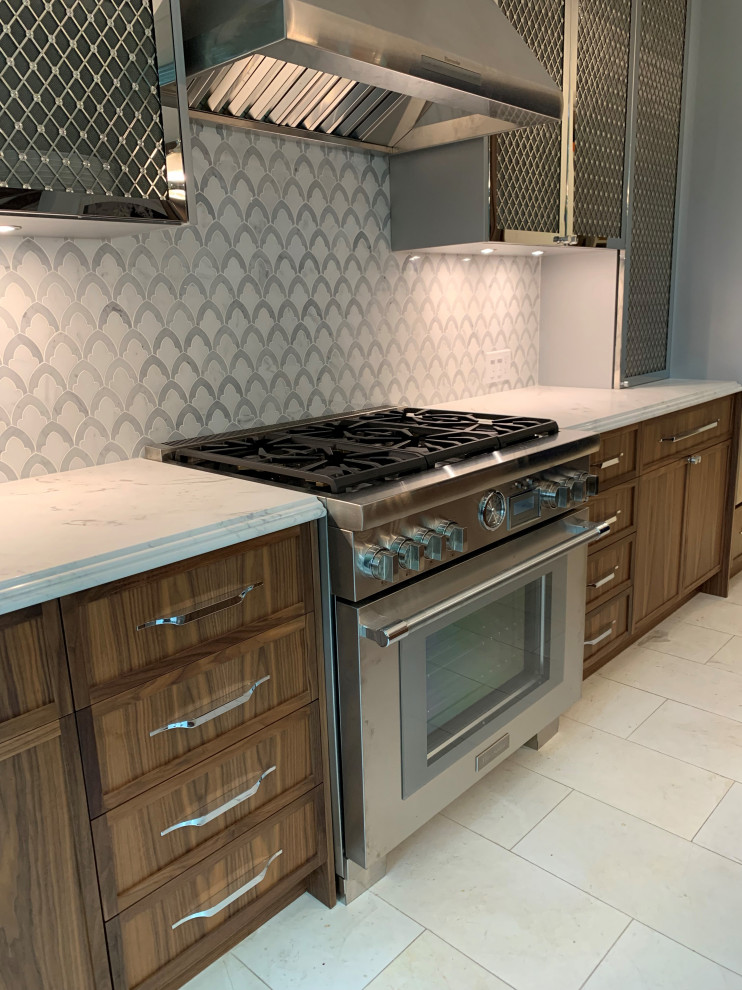 Inspiration for a mid-sized modern galley travertine floor, beige floor and wallpaper ceiling open concept kitchen remodel in Toronto with an undermount sink, shaker cabinets, medium tone wood cabinets, marble countertops, gray backsplash, marble backsplash, colored appliances, an island and white countertops