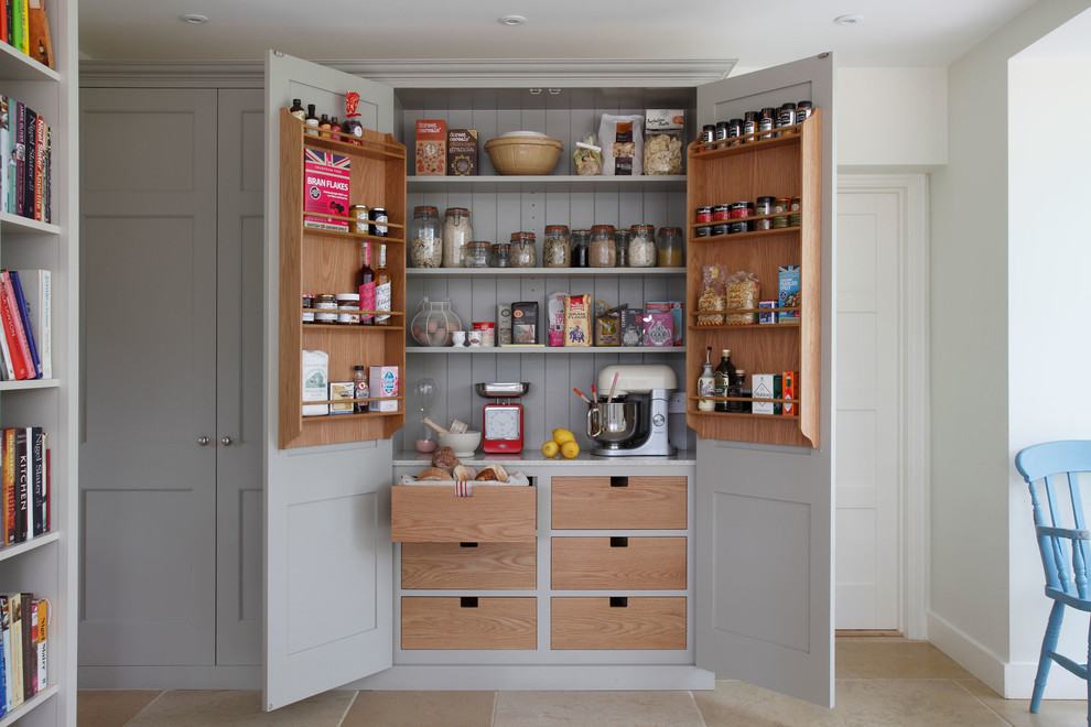 Design ideas for a country kitchen pantry in Surrey with grey cabinets.