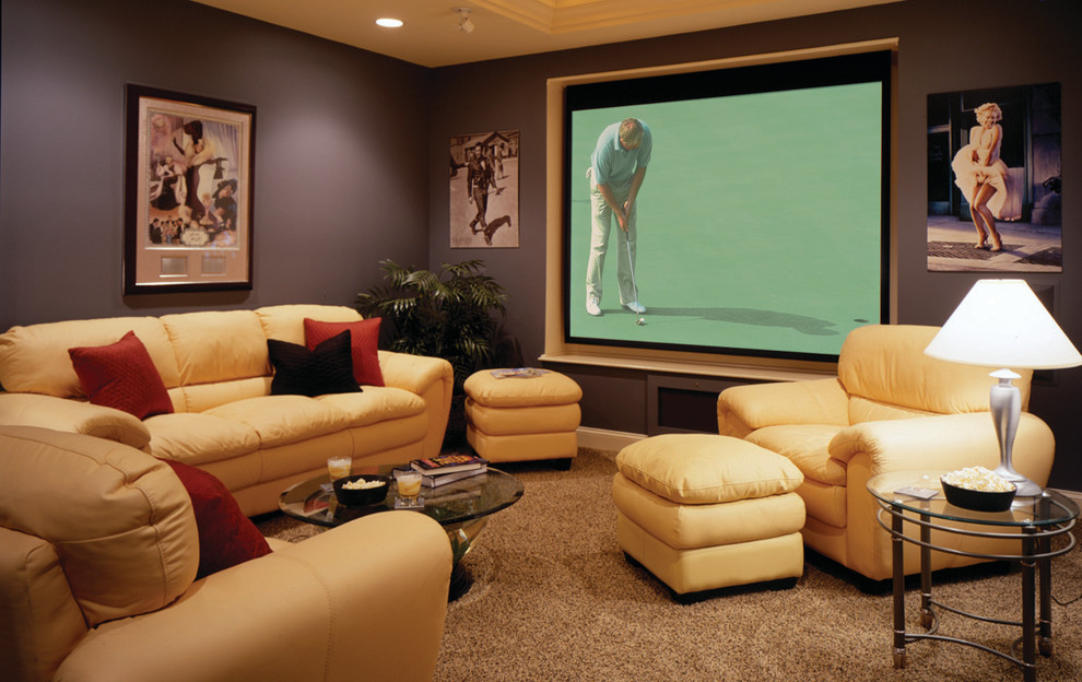 Mid-sized transitional enclosed home theatre in New York with purple walls, carpet, a projector screen and brown floor.