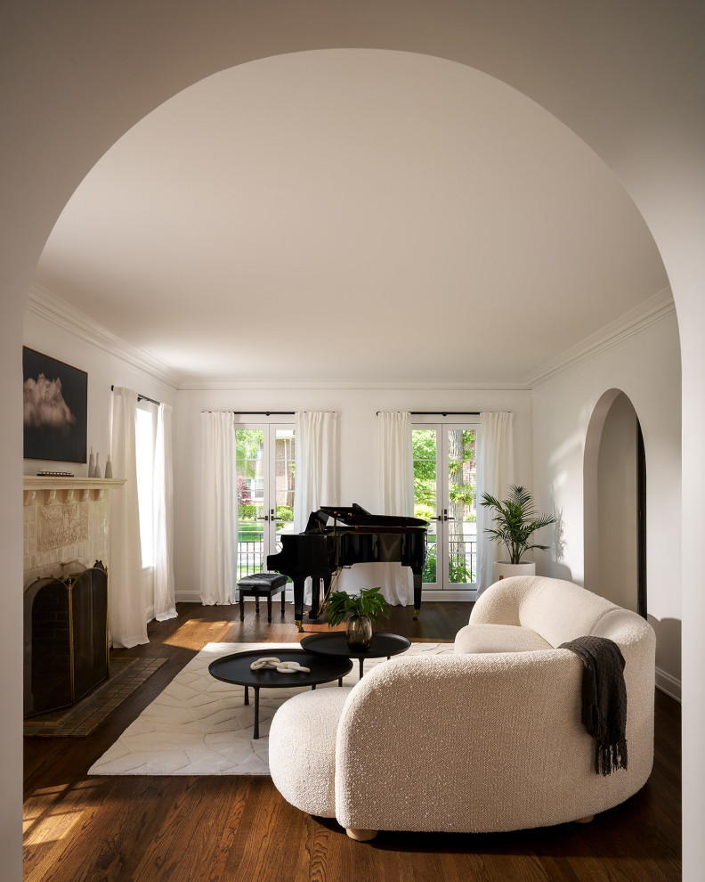 Transitional dark wood floor and brown floor living room photo in Chicago with white walls and a wall-mounted tv