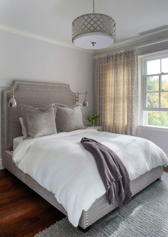 Design ideas for a transitional bedroom in Other with grey walls, dark hardwood floors and brown floor.