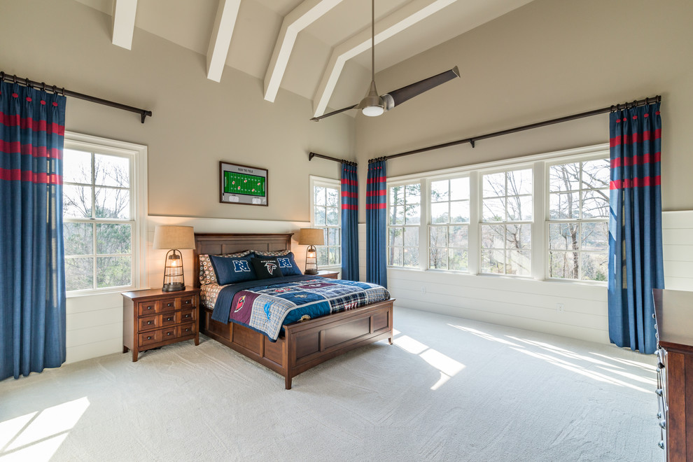 This is an example of a large transitional bedroom in Atlanta with grey walls, carpet and beige floor.